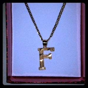 Gucci chanin & initial( F) charm over gold